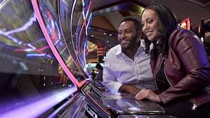 wither platform interface showing live-dealer tables, slot games, and sportsbook markets across mobile and desktop devices